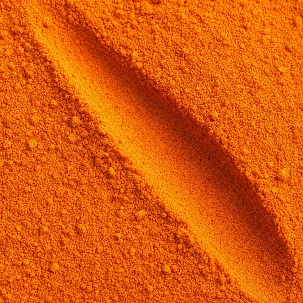 A close-up of fine orange Carrot Powder