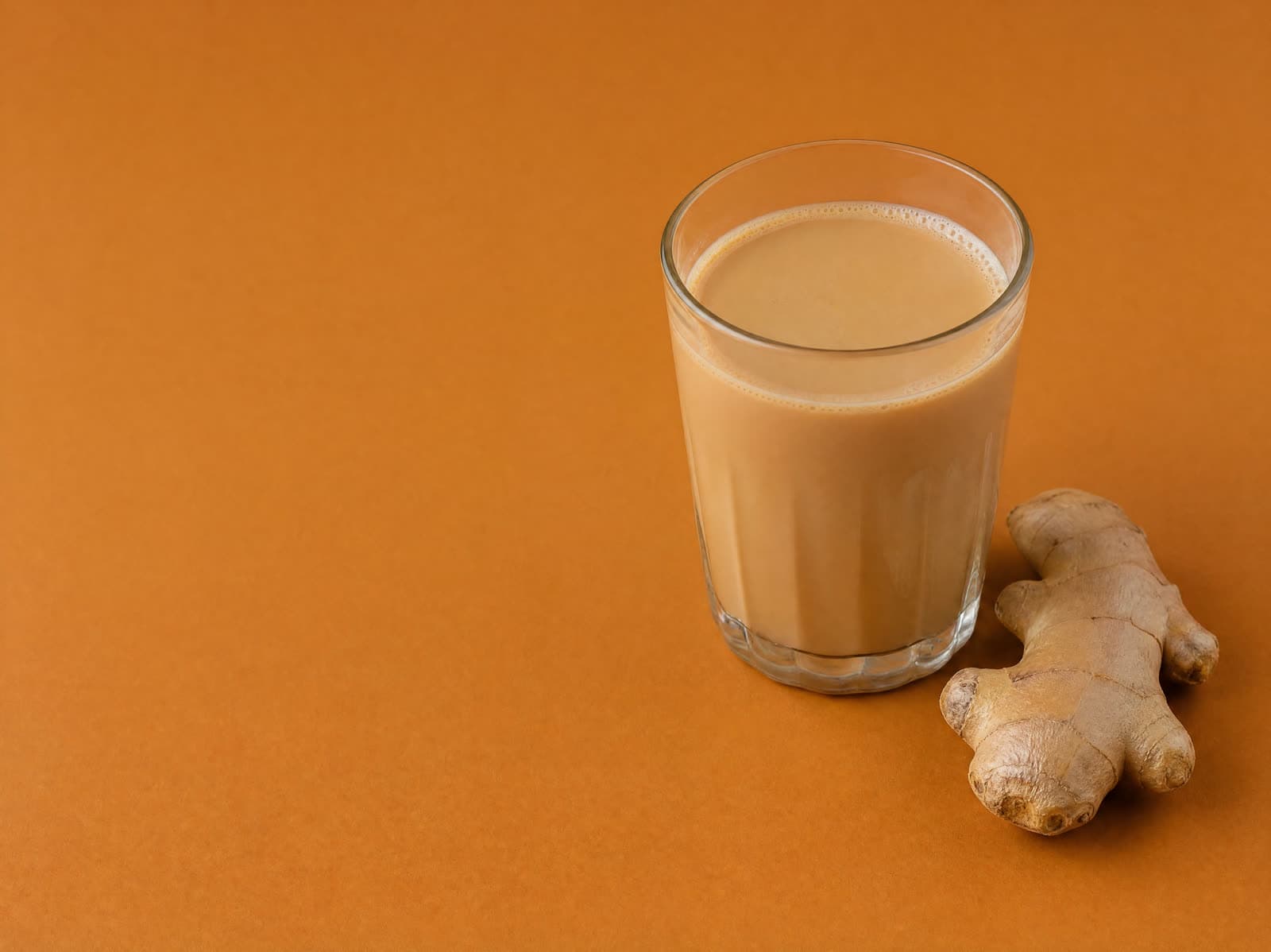 Ginger Powder stirred into a cup of adrak chai
