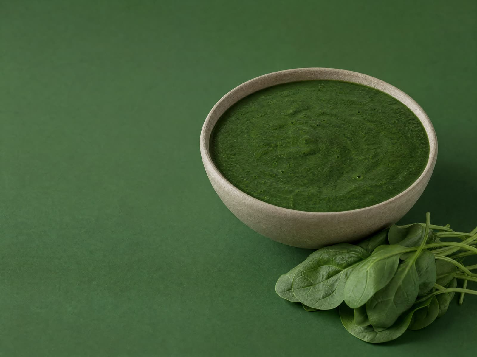 Spinach Powder blended into a green smoothie bowl