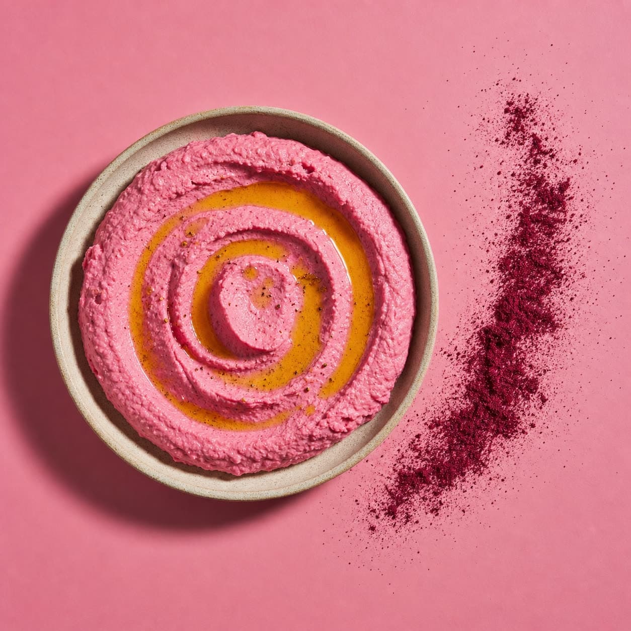 A bowl of bright pink Beetroot Hummus